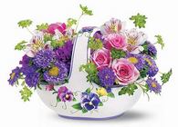 Teleflora's Sweet Pansy Basket Bouquet