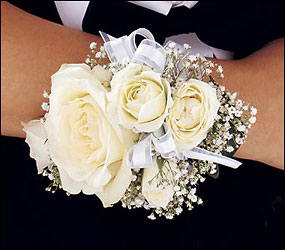 White Ice Roses Wristlet from Swindler and Sons Florists in Wilmington, OH
